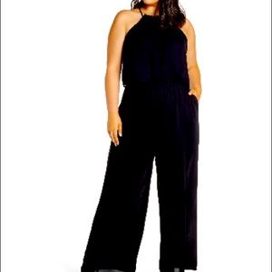 Black jumper NWT with pockets. Flowy pants and light weight.